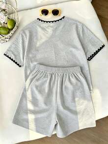 Bộ đồ 2 mảnh cho bé gái tuổi teen, áo thun và quần short in hình nơ và thêu hoa, kiểu dáng rộng rãi thoải mái, cổ tròn, tay ngắn, thích hợp cho mùa xuân, hè, mặc hàng ngày, nghỉ lễ, du lịch. - Nhiều màu - Xem 2