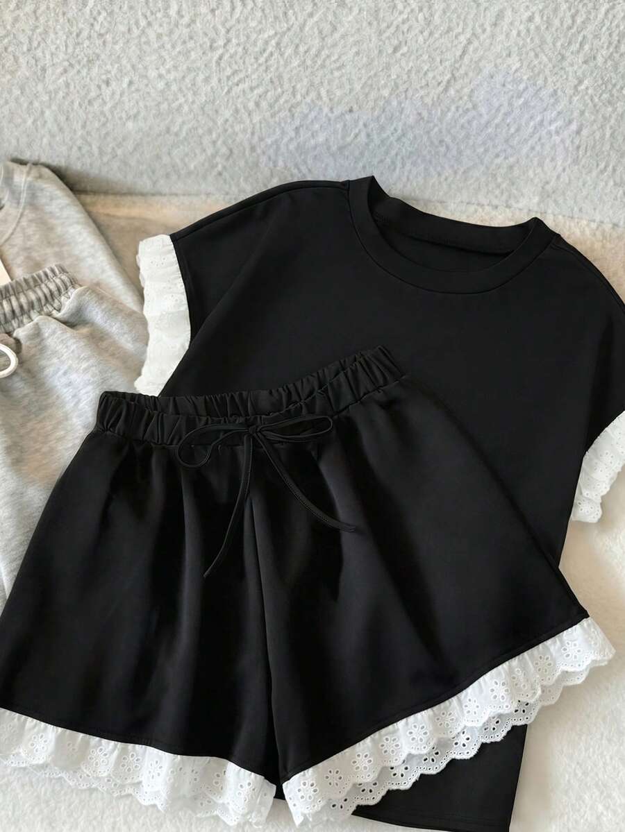 GlowEve Ensemble 2 pièces décontracté pour femmes avec Top à manches courtes col rond et bordure contrastée, et short - Noir - Voir 1