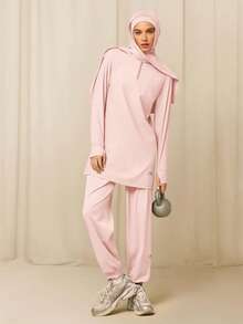 GLOWMODE Reem Modest 1PC Cool Flow 速干防晒连帽衫，带拇指孔和侧边开衩下摆，四分之一拉链，宽松版型，适合训练、跑步、健身、日常运动穿着。 - 粉色 - 查看 5