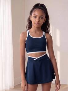 SHEIN Conjunto activo azul marino para niñas preadolescentes - Conjunto de top de tirantes y falda con diseño de color contrastante, tela suave y de gran elasticidad para fitness, tenis, trotar y deportes - Azul Marino - Ver 6