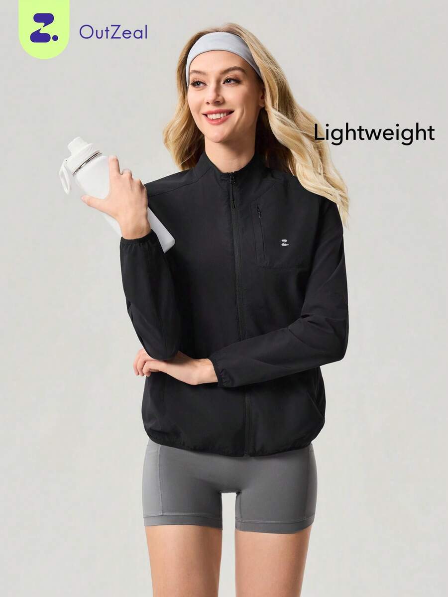 OutZeal Chaqueta negra deportiva para mujer, ropa de gimnasio, ligera, de manga larga con cremallera, parte superior activa - Negro - Ver 1