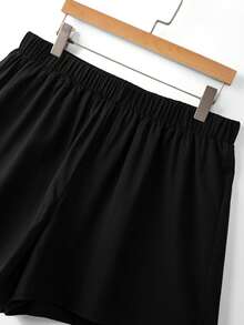 GlowEve CURVE Conjunto de 2 piezas de talla grande con blazer y pantalones cortos a rayas elegantes - Blanco y Negro - Ver 8