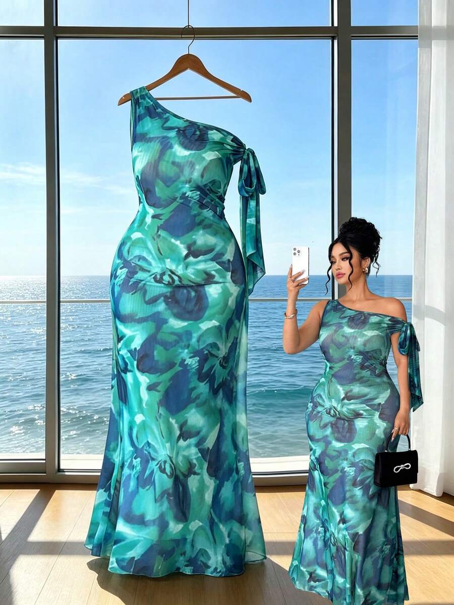 SHEIN Clasi Plus Size Women's Teal Summer Dress, Tropical Holiday Vacation Print Sleeveless Asymmetric Neck Bowknot Tie Waist Fishtail Hem Wedding Guest - Green - View 1
