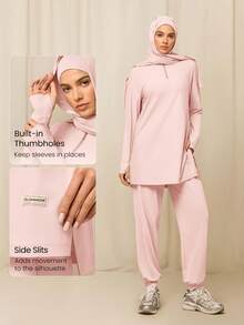 GLOWMODE Reem Modest 1PC Cool Flow 速干防晒连帽衫，带拇指孔和侧边开衩下摆，四分之一拉链，宽松版型，适合训练、跑步、健身、日常运动穿着。 - 粉色 - 查看 4