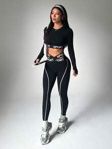 BamGleam 2pcs Women Seamless Contrast Stripe Letter Printed Elastic Waist Yoga Workout Long Sleeve Top & Cropped Leggings Sports Set - Black and White - View 4