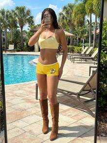 Flirla Quần short nữ thêu hoa lãng mạn - Nhiều màu - Xem 4