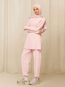 GLOWMODE Reem Modest 1PC Cool Flow 速干防晒连帽衫，带拇指孔和侧边开衩下摆，四分之一拉链，宽松版型，适合训练、跑步、健身、日常运动穿着。 - 粉色 - 查看 6