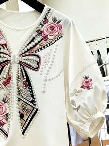 SHEIN Franclia Áo thun cổ tròn in hình hoa hồng nơ sang trọng, nhẹ nhàng, dáng rộng, tay cánh hoa giúp tôn dáng, áo lót casual thiết kế đính hạt thanh lịch cho nữ. - Màu be - Xem 4