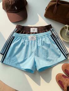 Comfortcana 2 chiếc quần short nữ cạp chun kẻ sọc dáng rộng, thích hợp cho mùa hè và mùa đông, đi chơi thường ngày, thể thao, phong cách Y2K, Giáng sinh, Năm mới. Quần short màu nâu Y2K, trang phục mùa hè cho nữ. - Nhiều màu - Xem 8