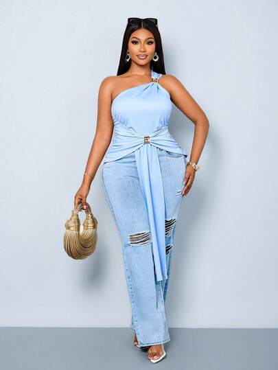 SOLERSUN Blusa sin mangas de un solo tirante para mujer talla grande, de unicolor, con espalda descubierta, confeccionada en tela de alta elasticidad y adornada con aplicaciones metálicas. Lujosa pero sencilla, estilizadora, sexy y versátil. El bajo irregular con cintas fluidas le da un toque único, haciéndola adecuada tanto para el día a día como para vacaciones en la playa. Perfecta para primavera y verano, Día de San Patricio, Pascua, festivales de música, fiestas, temporada de bodas, estilo callejero, picnics y otras ocasiones.
