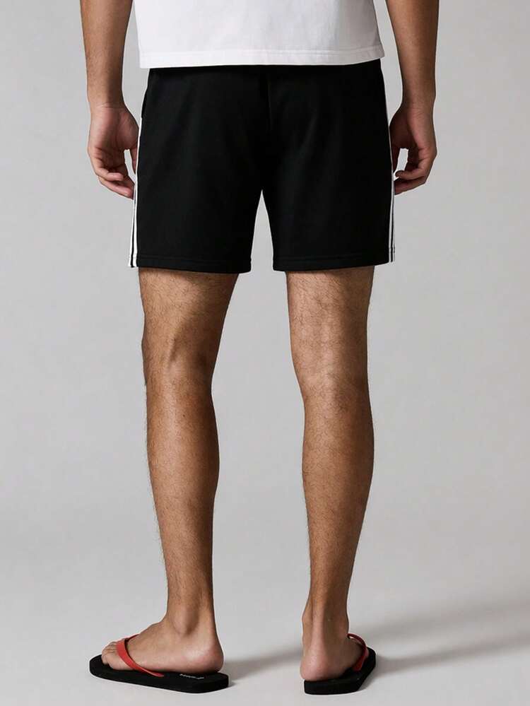 Pantalones cortos de verano casuales, de corte relajado, con raya lateral clásica negra, cintura elástica y cordón para hombre, ideales para vacaciones y playa