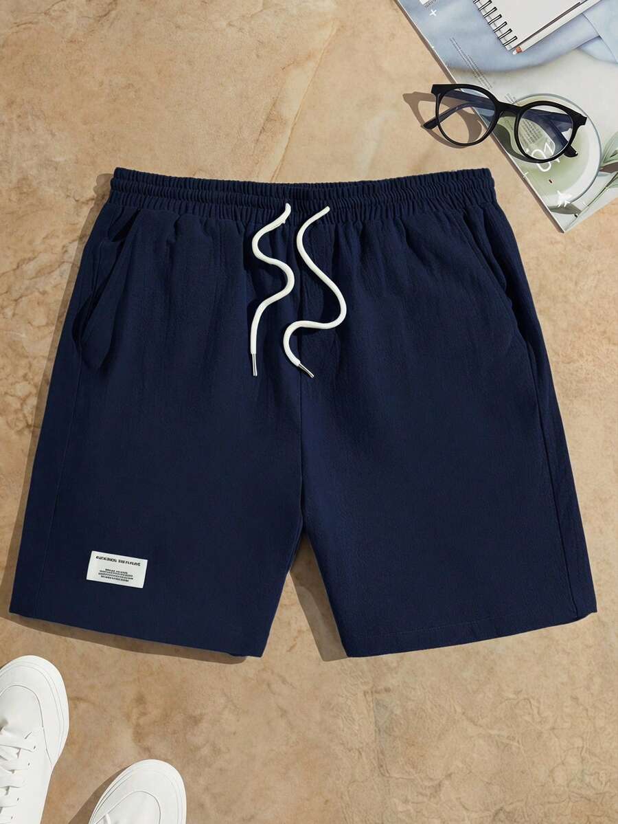 Manfinity VCAY Quần short nam dệt dây rút eo phong cách casual với túi chéo, đi nghỉ mát, quà tặng Ngày của Cha - Màu xanh lam - Xem 1