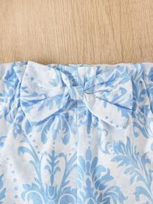 SHEIN Playful Pals 女嬰藍色夏季可愛度假節日復古植物印花無袖背心與短褲套裝 結飾提花圓領蝴蝶結短褲 2件套裝 - 淺藍色 - 查看 4