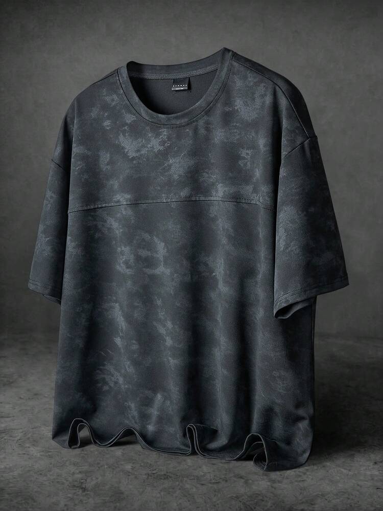 Camiseta de cuello redondo de manga corta con efecto tie-dye oversize y detalle de bajo deshilachado, estilo urbano de ropa de calle