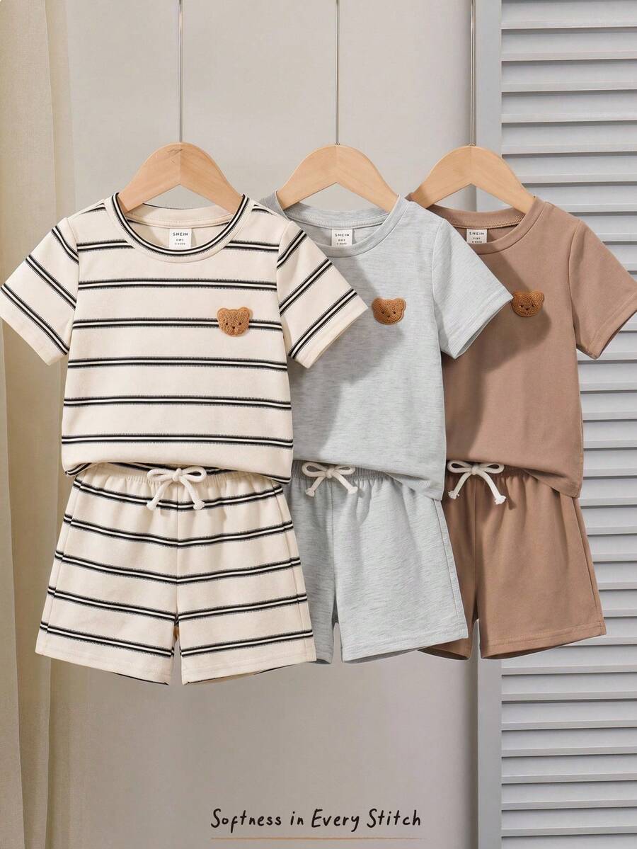 Cozy Pixies Bộ đồ 6 món cho bé trai gồm áo thun và quần short, họa tiết hoa và sọc dễ thương, áo thun ngắn tay và quần short cạp chun, chất liệu dệt kim co giãn thoải mái, họa tiết hoạt hình thường ngày, phù hợp cho mặc hàng ngày, đi nghỉ mát và du lịch. - Nhiều màu - Xem 1