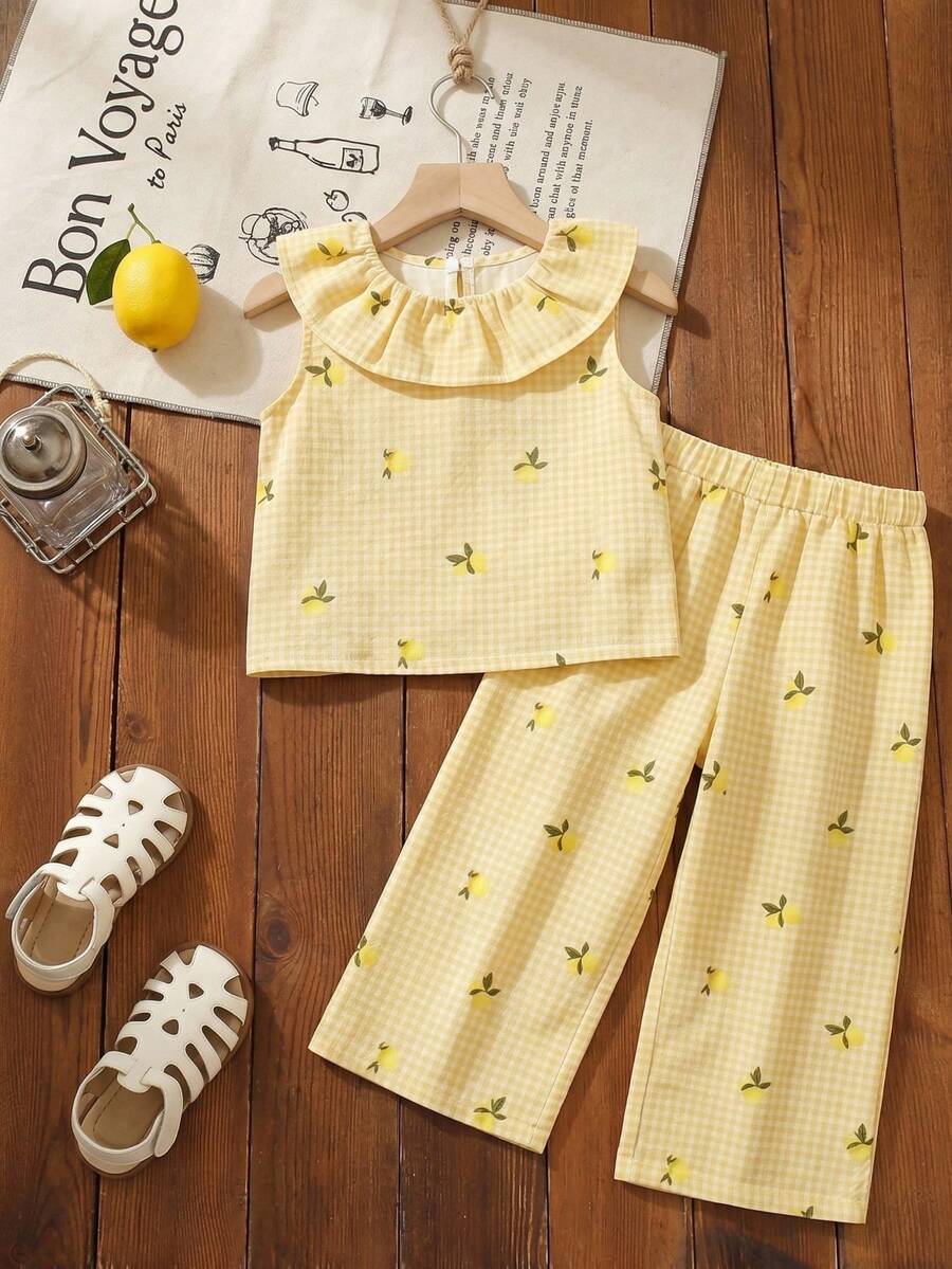 SHEIN 2 piezas Conjunto de top sin mangas con estampado de limón y pantalones, estilo dulce y lindo de princesa para niña, a cuadros amarillos + estampado de frutas de limón + cuello con volantes, adecuado para fiestas, actividades entre padres e hijos, uso diario, vuelta al colegio
