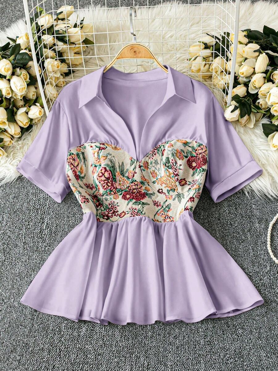 Rometta Plus Size Women's Elegant A-Line Short Sleeve Waist Cinched Vintage Jacquard Asymmetric Color Block V-Neck Peplum Top - Purple - View 1