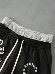 PAVTROS Bộ đồ nam phong cách đường phố gồm áo thun cổ tròn in họa tiết ánh kim và quần short cạp chun có dây rút. - màu đen - Xem 6