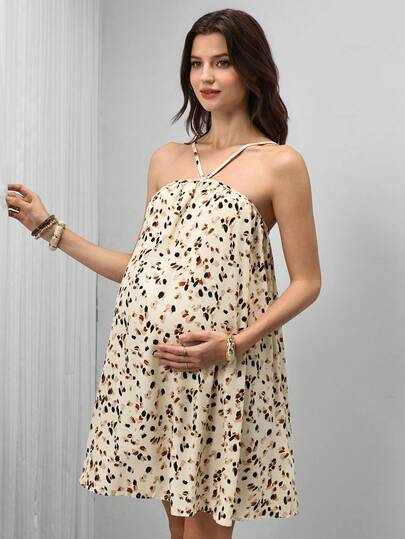 SHEIN Vestido de maternidad holgado con estampado floral y tirantes finos, adecuado para vacaciones y playa