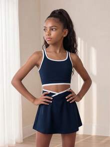 SHEIN Conjunto activo azul marino para niñas preadolescentes - Conjunto de top de tirantes y falda con diseño de color contrastante, tela suave y de gran elasticidad para fitness, tenis, trotar y deportes - Azul Marino - Ver 3