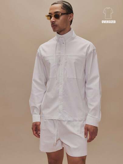Musero Camisa Essencial para Primavera e Verão com Gola Funil de Manga Longa Oversized, Cordão, Bolso Frontal e Detalhes Costurados