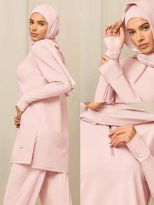 GLOWMODE Reem Modest 1PC Cool Flow 速干防晒连帽衫，带拇指孔和侧边开衩下摆，四分之一拉链，宽松版型，适合训练、跑步、健身、日常运动穿着。 - 粉色 - 查看 7