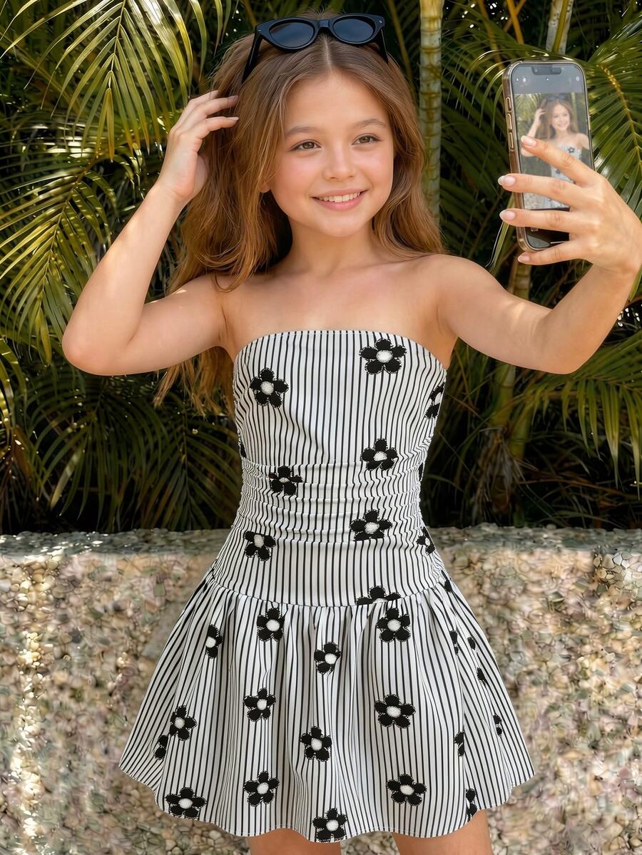 SHEIN Vestido de niña preadolescente casual minimalista y cómodo con diseño plisado sin mangas y de corte abombado - Blanco y Negro - Ver 1