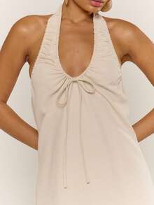 MUSERA Vestido mini con escote profundo, fruncido, cuello halter y detalle de lazo delantero - Lindo y sexy para vacaciones, primavera, verano, festivales, chica cool, vintage - Crema - Ver 1