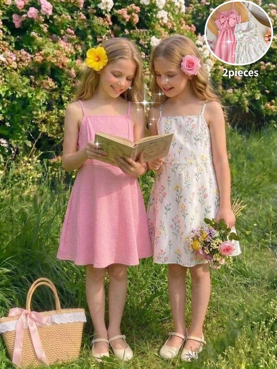 SHEIN Conjunto de 2 piezas para niñas preadolescentes: vestido de tirantes, diseño con lazo en la espalda, estampado floral, tela texturizada rosa, estilo casual y holgado para verano y vacaciones - Multicolor - Ver 1