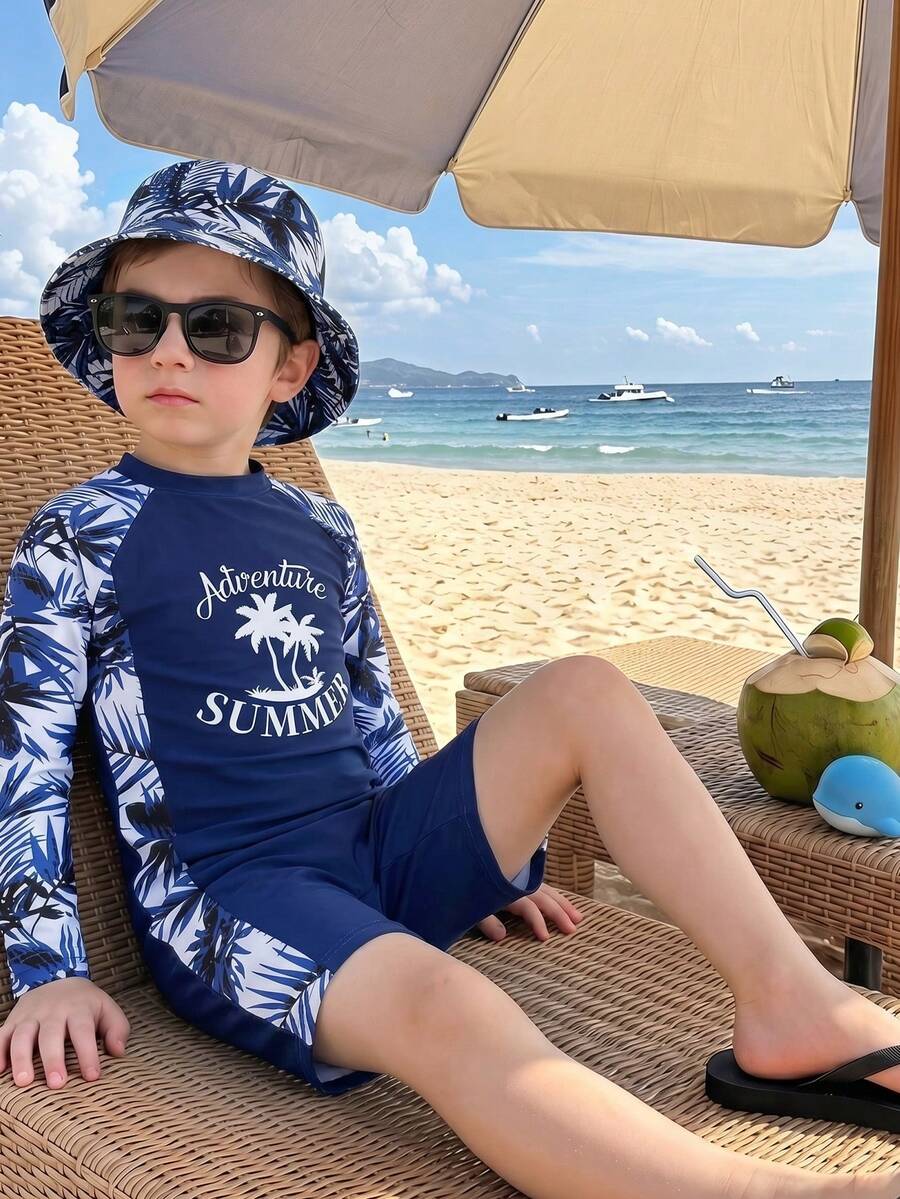 SHEIN Traje de baño de protección solar con estampado de palmeras de manga larga, estilo de vacaciones de moda, en patchwork y contraste de colores, adecuado para playa, natación y surf, para niños pequeños y niños