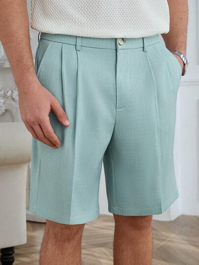 Core Aspect Pantalones cortos rectos casuales con bolsillos sesgados y plisados en verde para hombres
