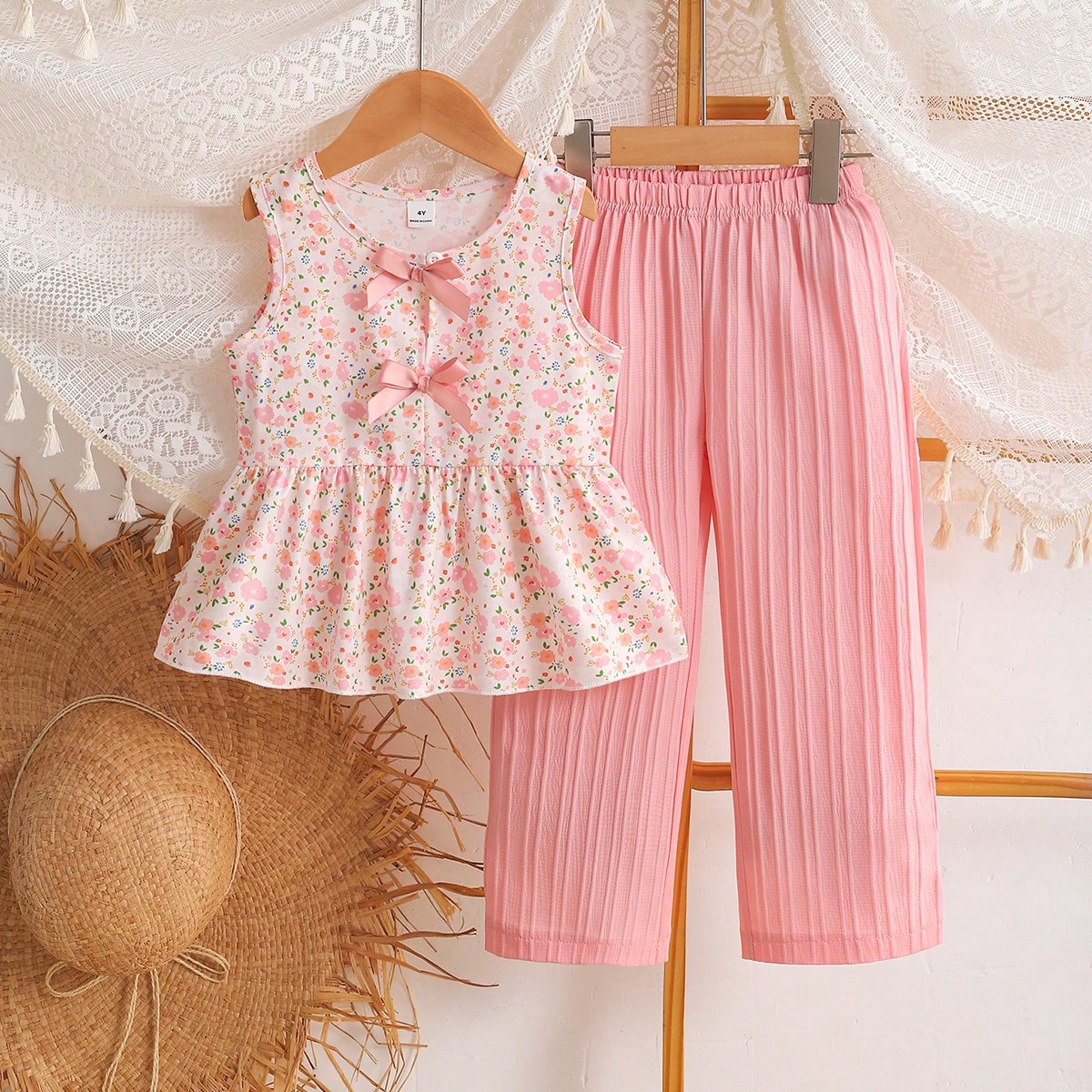 Conjunto de 2 piezas floral para niñas pequeñas, blusa sin mangas con decoración de moño rosa + pantalones anchos de textura, conjunto casual dulc