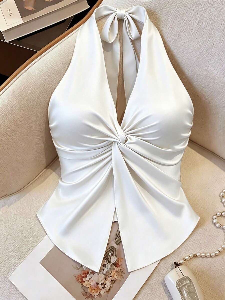 Qadelle Camiseta de punto elástica con escote halter, dobladillo asimétrico y abertura, adecuada para fiestas, citas, cenas, temporada de bodas, festivales, uso casual diario, ir al trabajo y vacaciones - Blanco - Ver 1