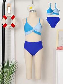 SHEIN Bộ bikini cho bé gái tuổi teen, kiểu dáng tối giản tươi mát với áo phối màu xanh tương phản và thiết kế xoắn phía trước, cổ chữ V, dây mảnh, quần cạp cao màu xanh navy trơn, 2 mảnh, chất liệu vải dệt kim, thời trang, thoải mái, thanh lịch, thích hợp cho bơi lội, kỳ nghỉ hè, bãi biển, hồ bơi, tiệc tùng, kỳ nghỉ thư giãn, đồ bơi hai mảnh kiểu yếm. - Nhiều màu - Xem 1