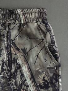 STYNVO Quần short nam dáng casual, in họa tiết cành cây, cạp chun, có dây rút. - Đồng - Xem 4