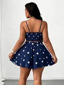 SHEIN Unity Bộ đồ hai mảnh đa năng dành cho nữ cỡ lớn, gồm áo hai dây in hình trái tim thanh lịch, hở lưng, thắt eo kiểu cánh bướm, dáng chữ A, phù hợp cho đi biển, dự tiệc, lễ hội âm nhạc, mùa xuân/hè. - Xanh và trắng - Xem 2
