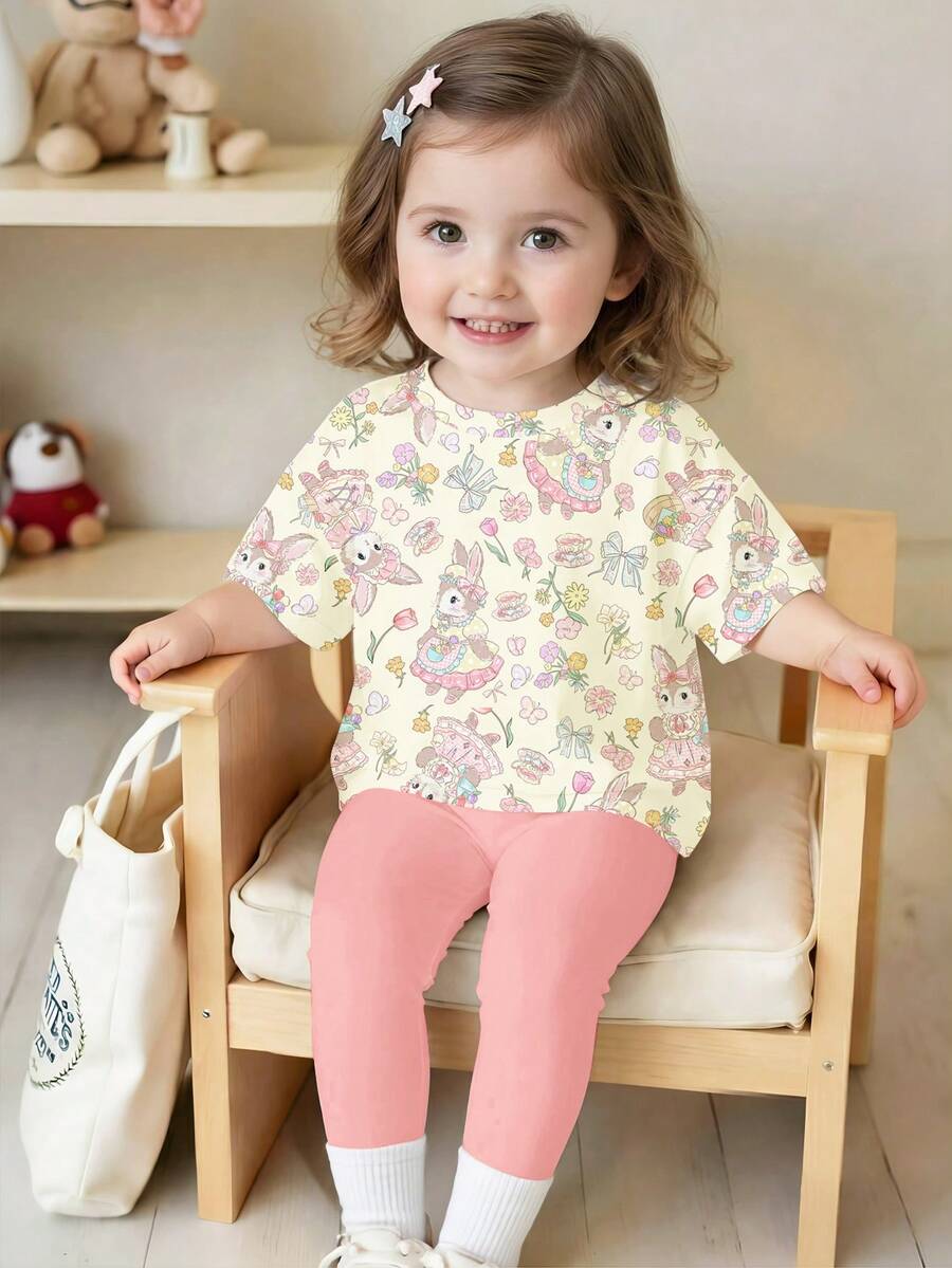 Bộ đồ thường ngày cho bé gái gồm áo thun ngắn tay in hoa và quần legging. - trắng - Xem 1