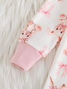 Cozy Pixies Bộ đồ ngủ hai mảnh cho bé gái, gồm áo dài tay cổ tròn mềm mại và quần dài cạp chun, họa tiết thỏ và nơ, thích hợp mặc ở nhà, đi nghỉ mát, lễ Phục Sinh, mặc nhiều lớp và nhiều dịp khác. - Nhiều màu - Xem 4