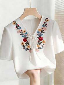 Franclia Plus Size Women's White Summer Boho Vacation Shirt,V-Neck Semi-Sheer Short Sleeve Regular Fit Casual Floral & Botanical Embroidery Resort Wear Top - White - View 3
