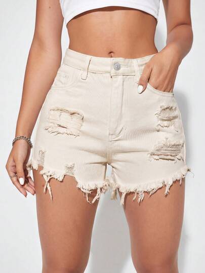 SHEIN Essnce Quần short denim rách gối có túi dành cho nữ.