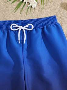 SHEIN Celana Pendek Pantai Satu Potong untuk Anak Laki-Laki Remaja, Kain Tenun, Motif Tetap, Cocok untuk Liburan Pantai dan Bermain di Laut - Navy Blue - View 4