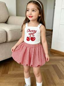 Bộ áo hai dây in hình quả anh đào và chân váy xòe kẻ caro cho bé gái, trang phục tươi tắn và ngọt ngào, phù hợp cho đi học hàng ngày, dã ngoại mùa hè, tiệc sinh nhật, phong cách đồng quê. - Đỏ - Xem 7