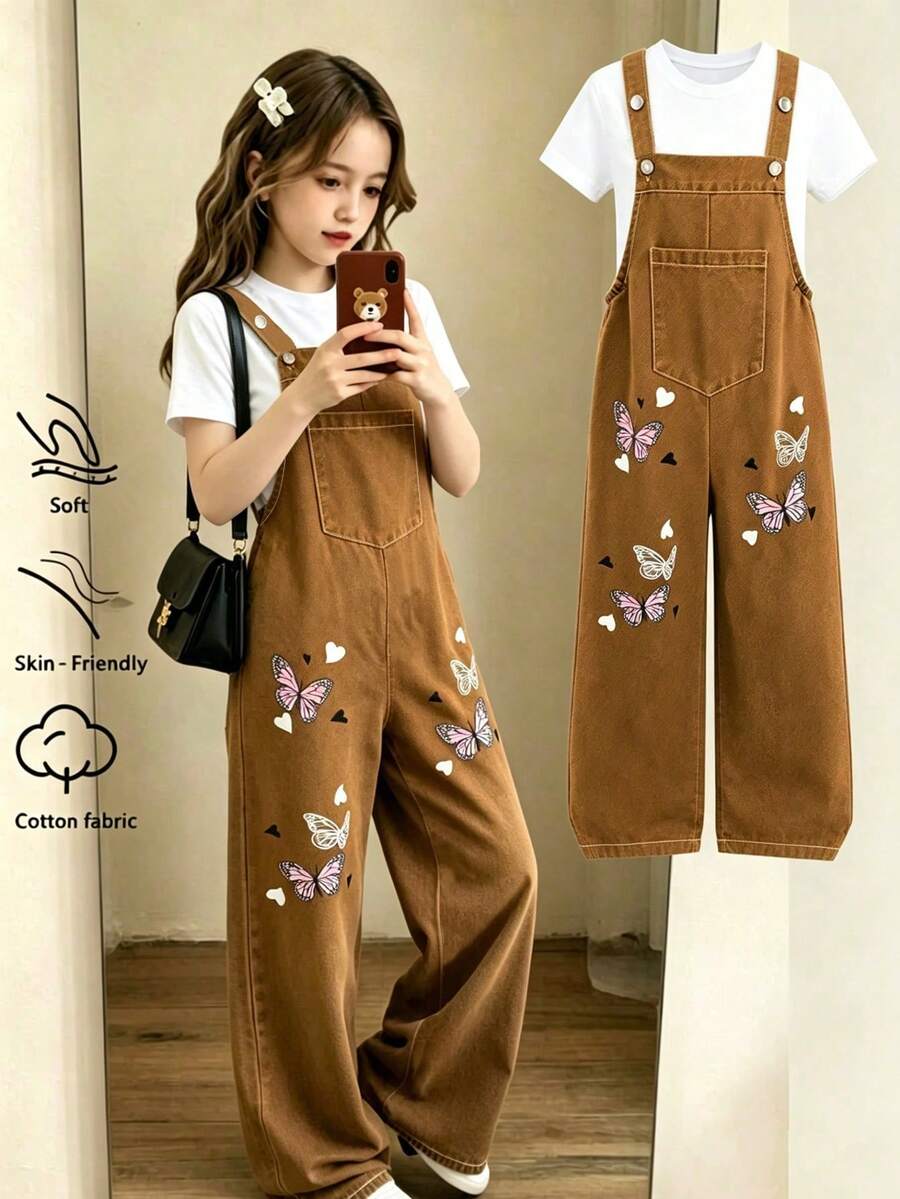 SHEIN 少女夏季休闲时尚新款连体裤，可爱蝴蝶数码印花图案金属纽扣肩带牛仔长裤，适合少女返校季穿着，可爱甜美活泼的女士日常、学校、郊游、旅行、派对、拍照，儿童服装，女童服装套装，女童服装，儿童背带裤夏季套装。