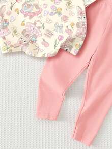 Bộ đồ thường ngày cho bé gái gồm áo thun ngắn tay in hoa và quần legging. - trắng - Xem 7