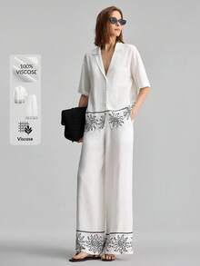 Ontre Blouse ample à imprimé soleil, floral et végétal peint à la main noir et blanc avec épaules tombantes, pantalon à taille élastique. Tenue bohème de plage, urbaine chic décontractée, de haute qualité pour l'aéroport, la croisière, les invités de mariage. Ensemble 2 pièces au look minimaliste de luxe, polyvalent - Noir et Blanc - Voir 2