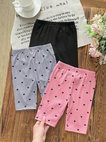 Bộ 3 quần legging mùa hè cho bé gái với sự kết hợp đa dạng giữa màu hồng, đen và tím nhạt cùng họa tiết trái tim dễ thương và các kiểu dáng trơn màu, được làm từ chất liệu vải dệt kim mềm mại, thân thiện với làn da, mang lại cảm giác thoải mái khi chơi đùa hoặc các hoạt động thường ngày cho bé gái. - Nhiều màu - Xem 1