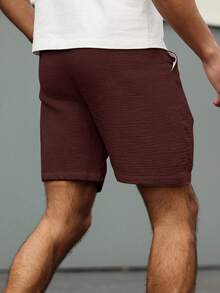 VENTUSAIL Pantalones cortos casuales para hombres de unicolor, de corte holgado, con bolsillos en diagonal y cordón en la cintura - Café integral - Ver 2