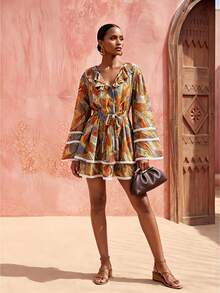 Zivah Đầm croptop tay bồng độc đáo, thanh lịch, phong cách bohemian, chất liệu chiffon mỏng in họa tiết, thích hợp cho kỳ nghỉ biển năm 2026. Đầm ngắn in họa tiết chiffon, kiểu dáng bohemian, thích hợp cho kỳ nghỉ. - Nhiều màu - Xem 9