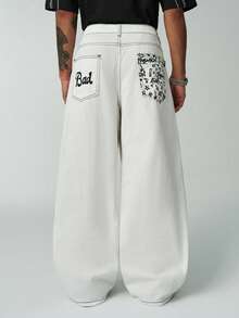 ÉpureWay Quần jeans ống rộng dáng suông, in hình nốt nhạc cổ điển và chữ "Bad" theo phong cách graffiti, kiểu dáng đường phố thường ngày. - trắng - Xem 1