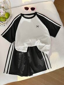 SHEIN Conjunto informal de camiseta de manga corta con estampado de lazo y pantalones cortos para adolescentes - Blanco y Negro - Ver 4